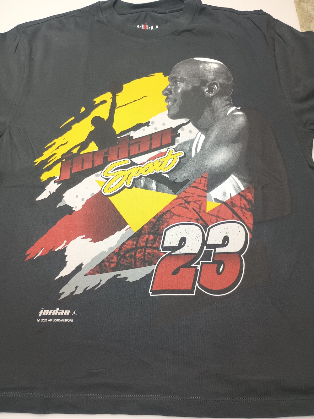 Jordan Sport Black Graphic Tee with Red, Yellow, White and Gray Print Size M